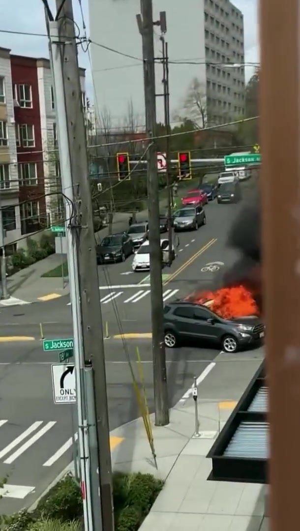 Guy decides to drop pants to piss by car fire