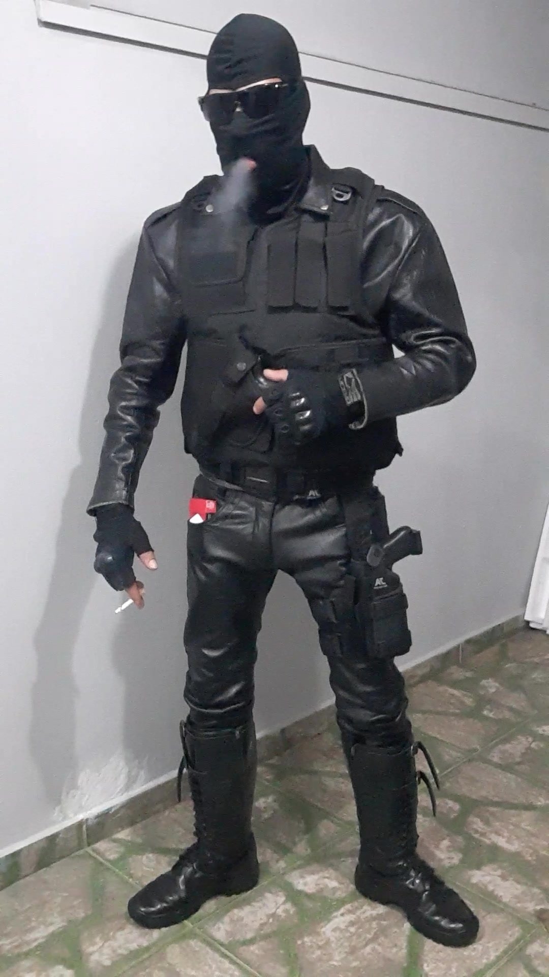 Cop full leather, new war vest smoking  marlboro
