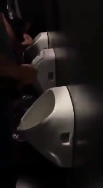 guys wanking at urinals
