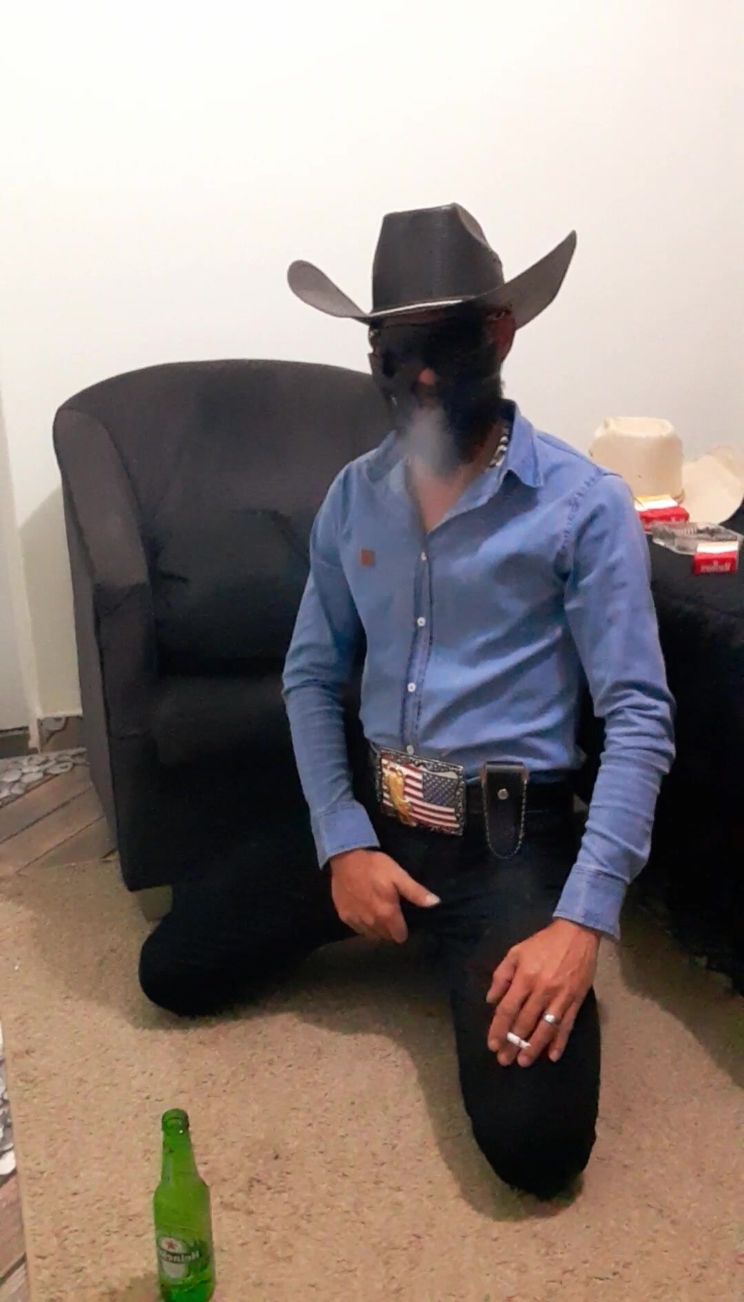cowboy smoking and stepping on a box of marlboro