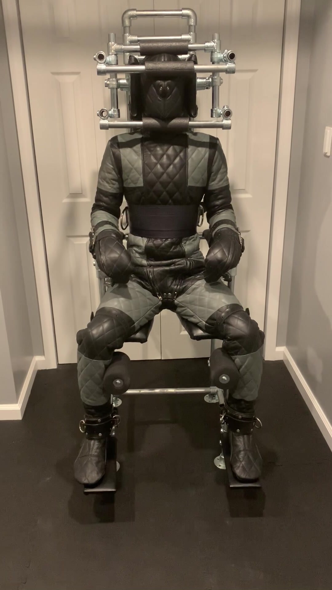 Chair Bound in the Leather Prison Suit