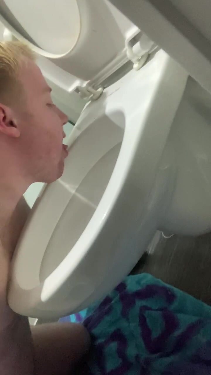 young fag cleaning toilet