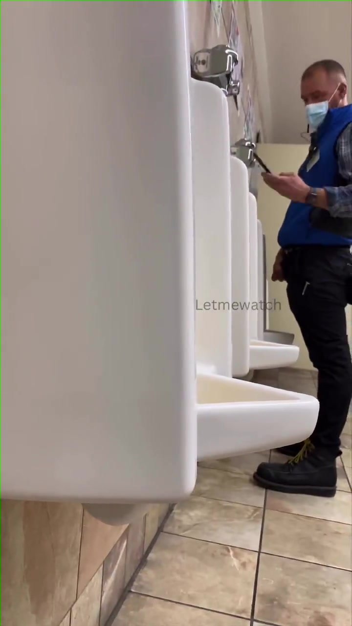 Urinal huge thick airport worker