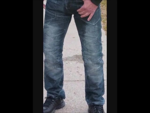 Wetting jeans in a park.