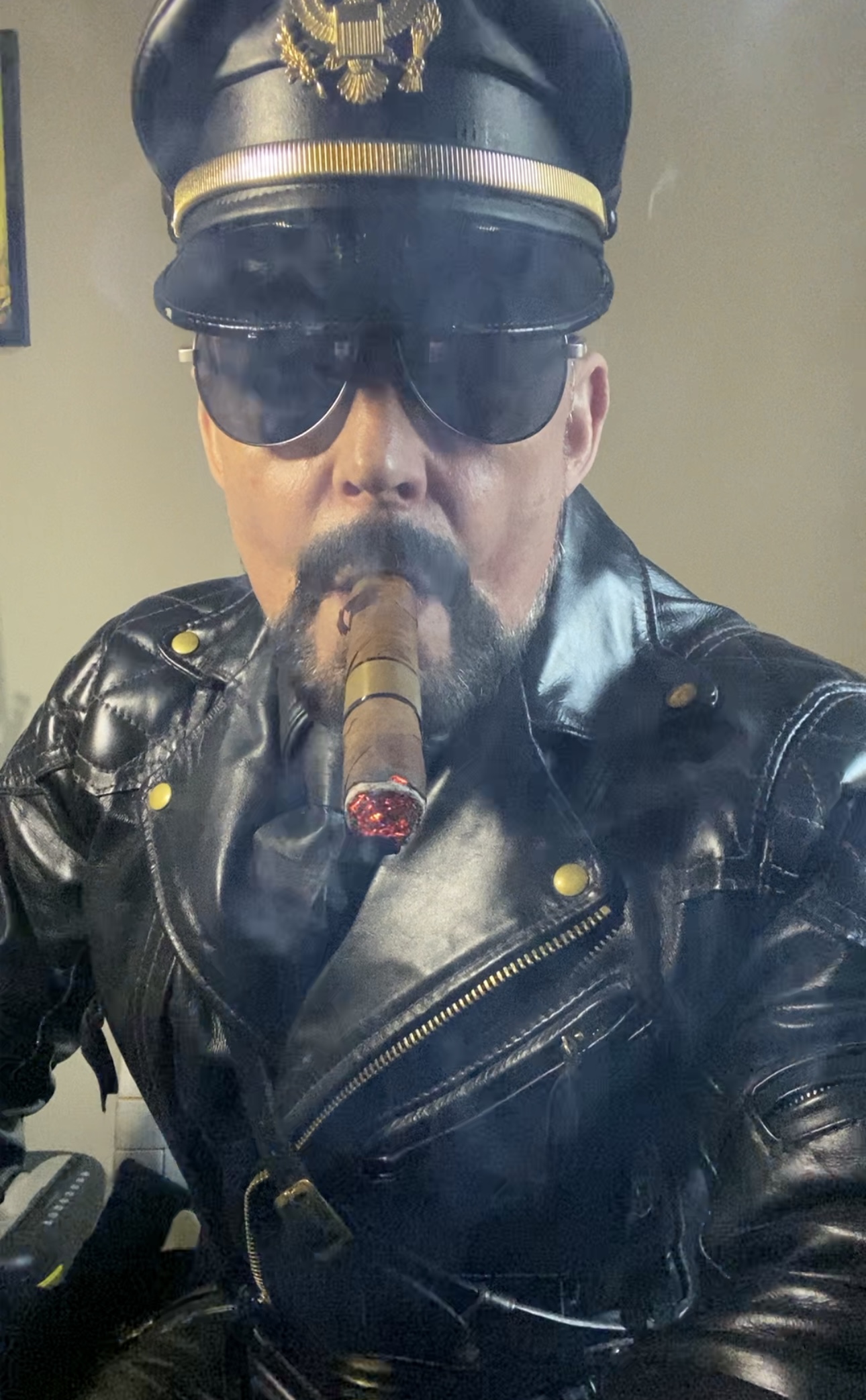 Langlitz Leathermaster enjoys a cigar