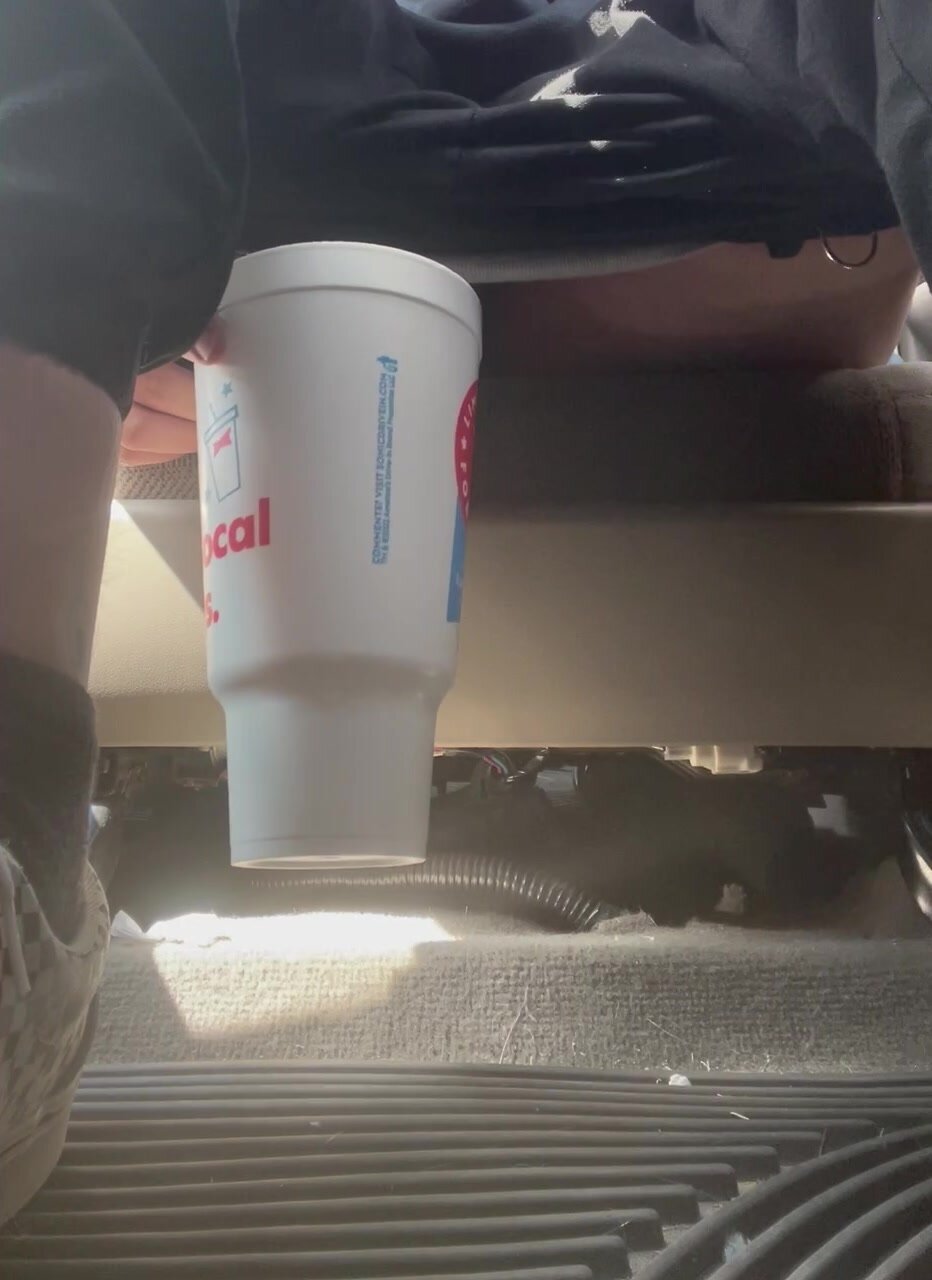 FTM nervous pissing in cup in busy parking lot