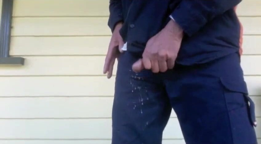 Blue collar worker smokes and spunks down his trousers