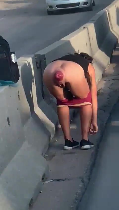 Girl bends over on side of highway prolapsing asshole