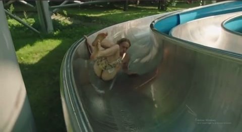 Mooning down a water slide