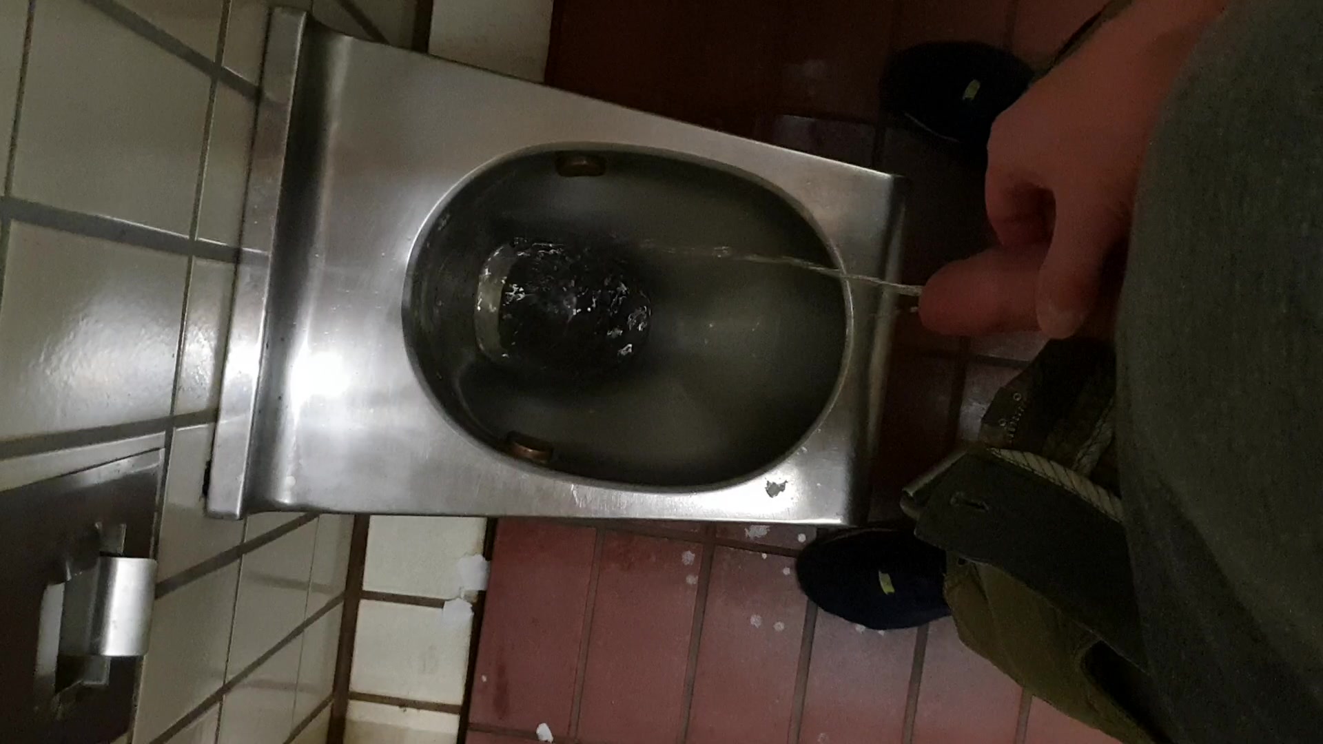 Pissing in a public toilet - video 2