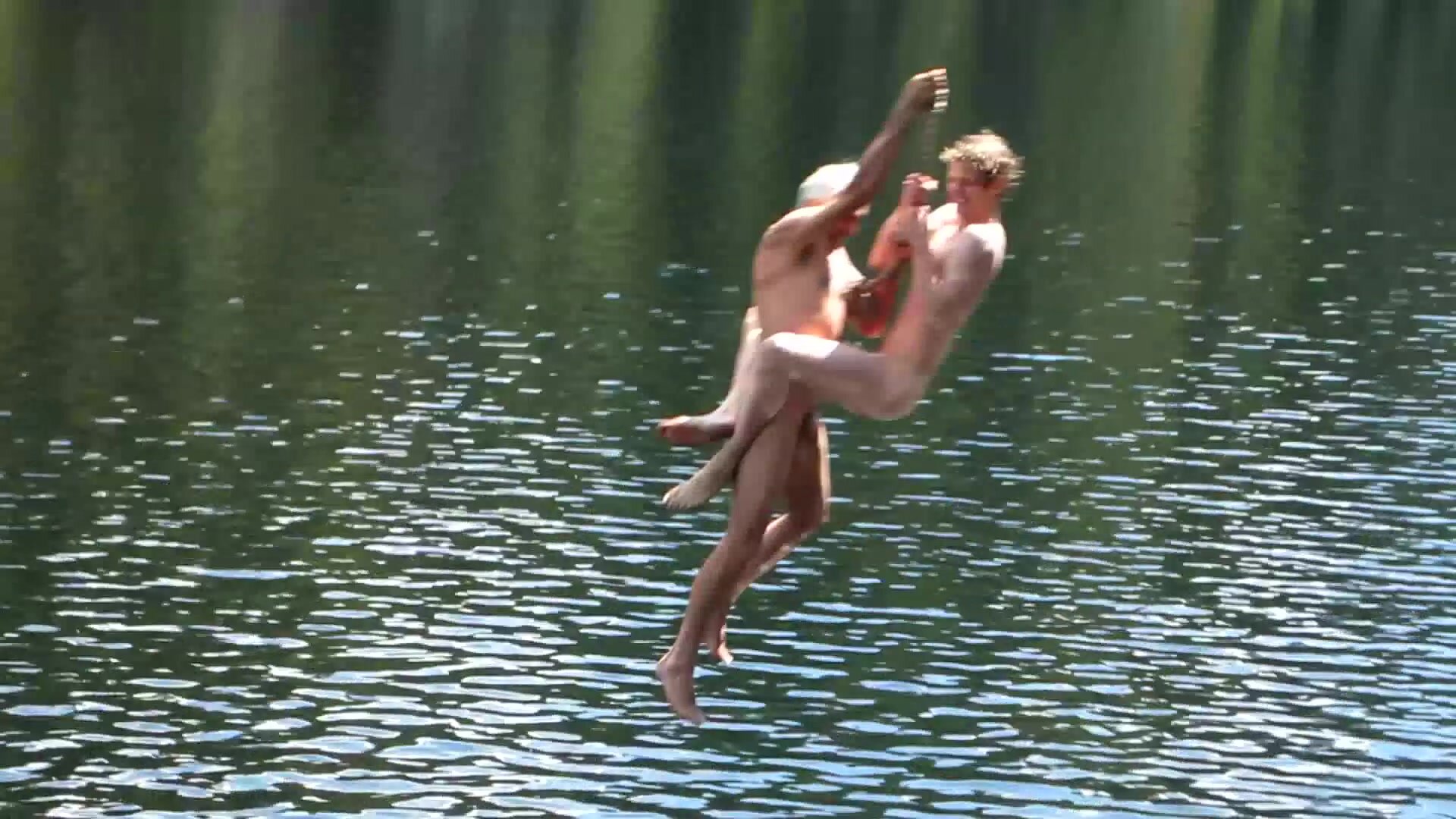 two naked friends skinny dipping