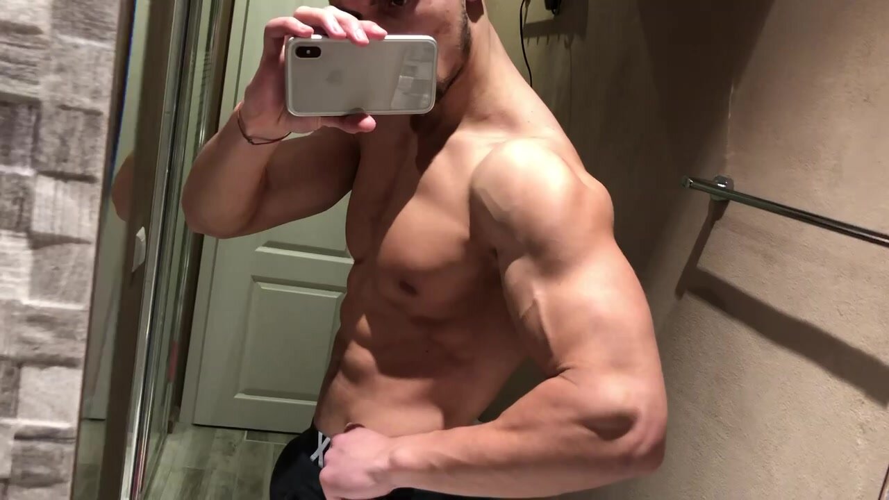 Muscle Stud: Flexing Shirtless in the Mirror