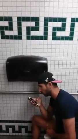 Male jacking off in public restroom