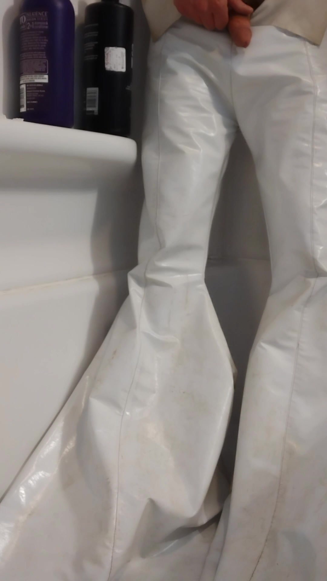 Pissing on my dirty white latex Bell Bottoms
