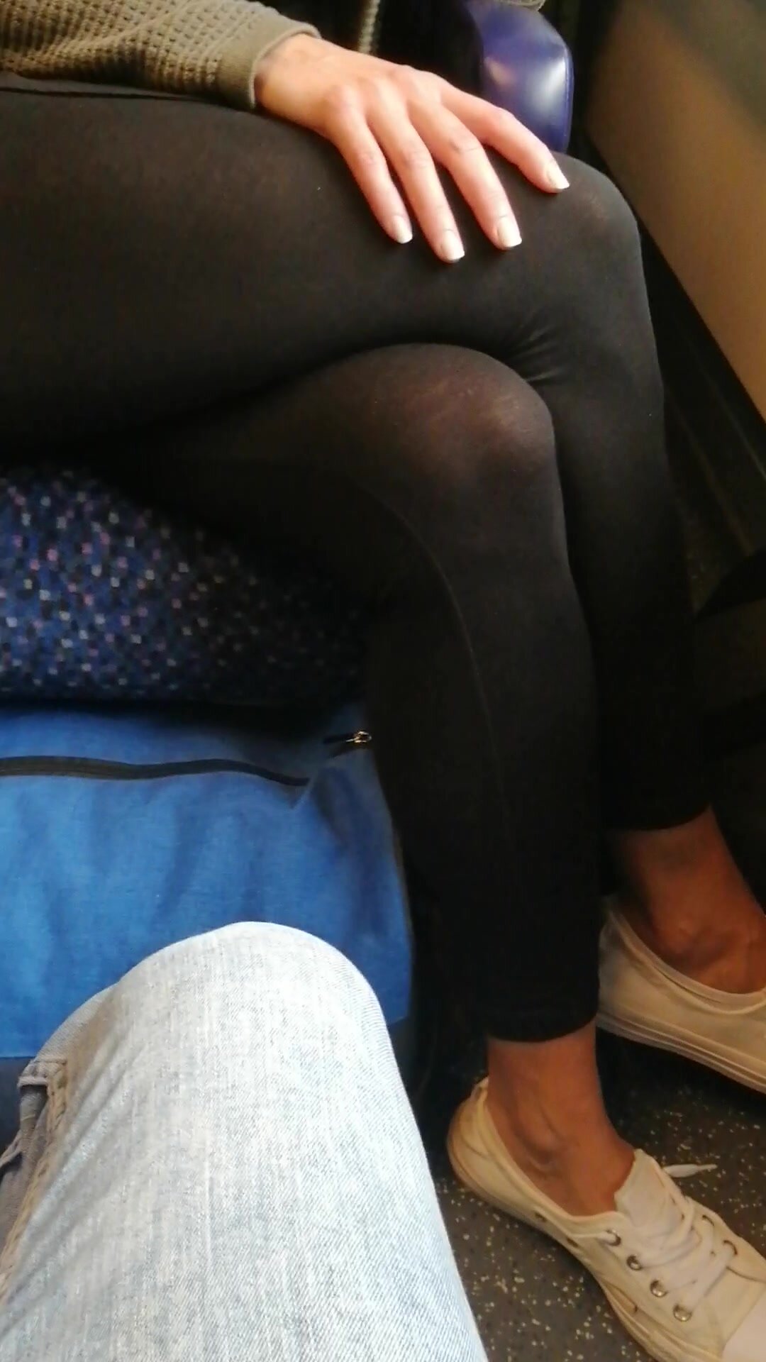 Blonde woman with beautiful legs in public train