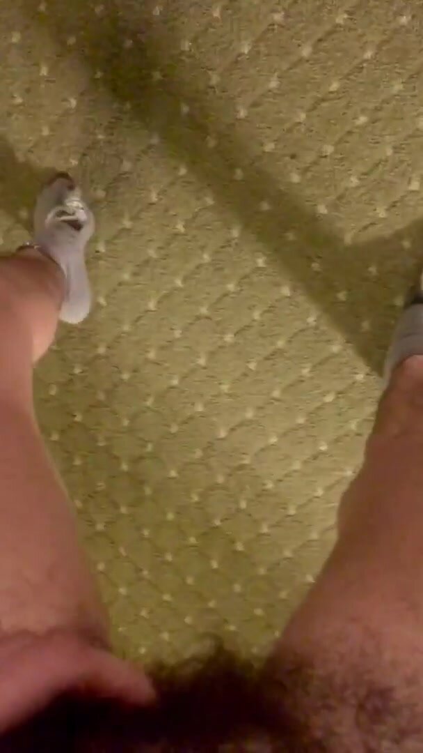 Hairy gal pissing all over her hotel room