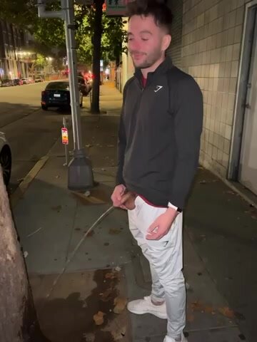 Risky piss on public sidewalk