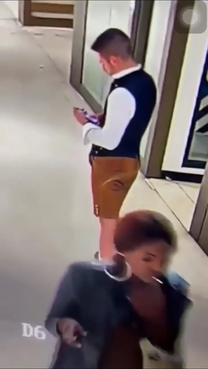 woman peeing on escalator