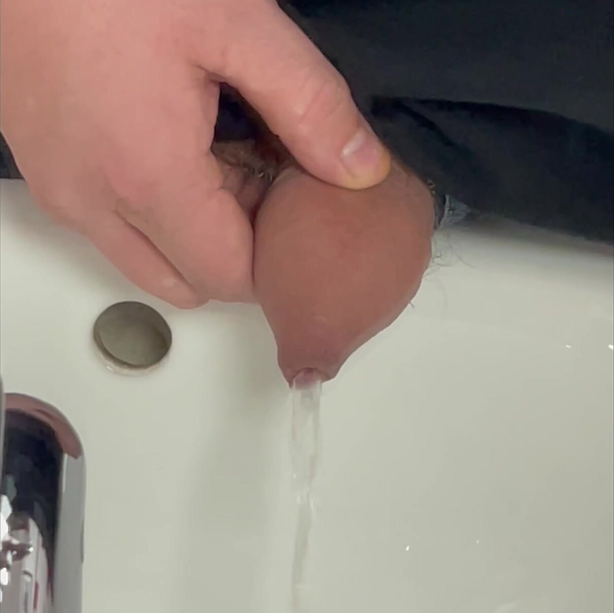 Peeing in a sink - video 2