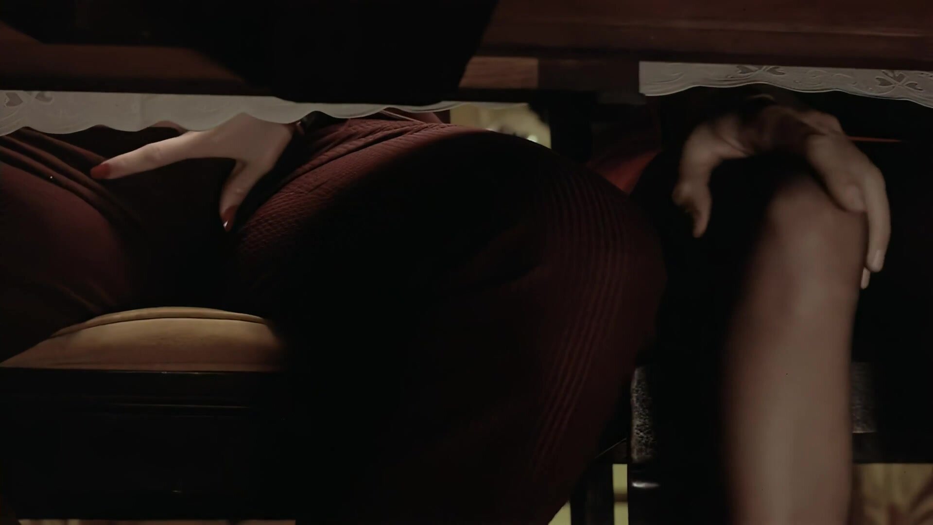 Ballbusting squeeze under table