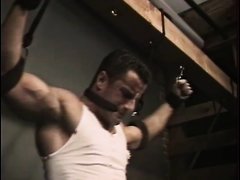 Muscle Master and slave--bondage and flogging