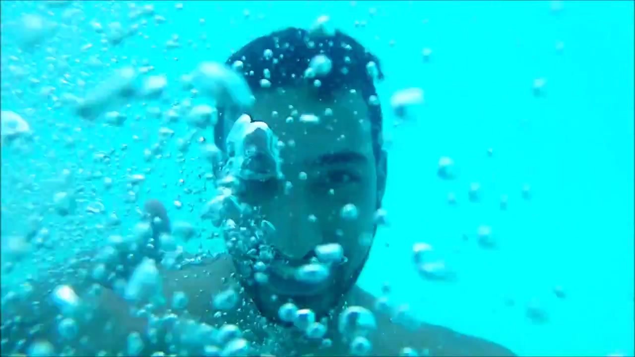 Greek cutie jumping barefaced to underwater pool