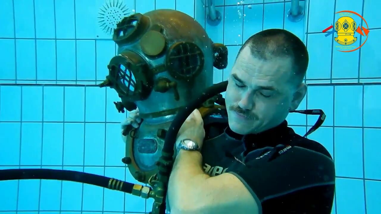 Dutch helmet diver going barefaced underwater
