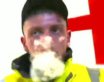 Scally worker smokes
