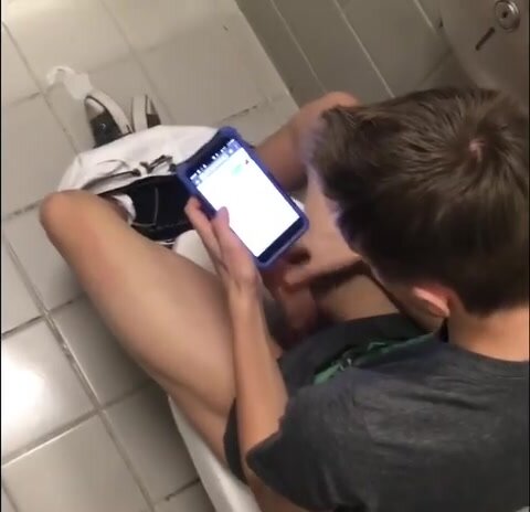 Hot boy wanks on toilet