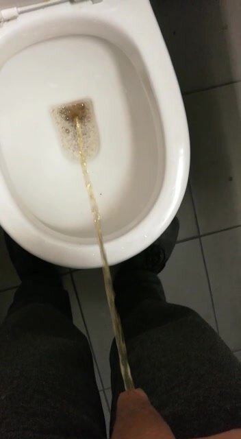 Big dick master pissing in the toilet