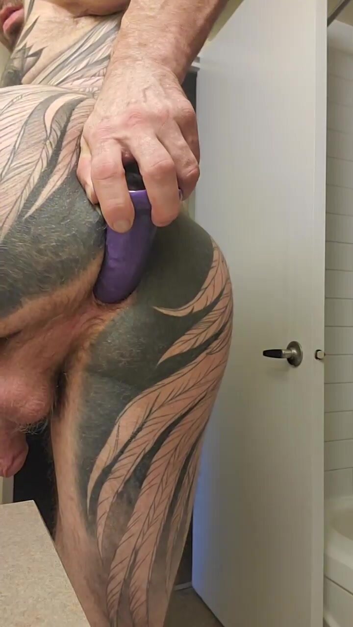 tatt muscle jock & purple dildo