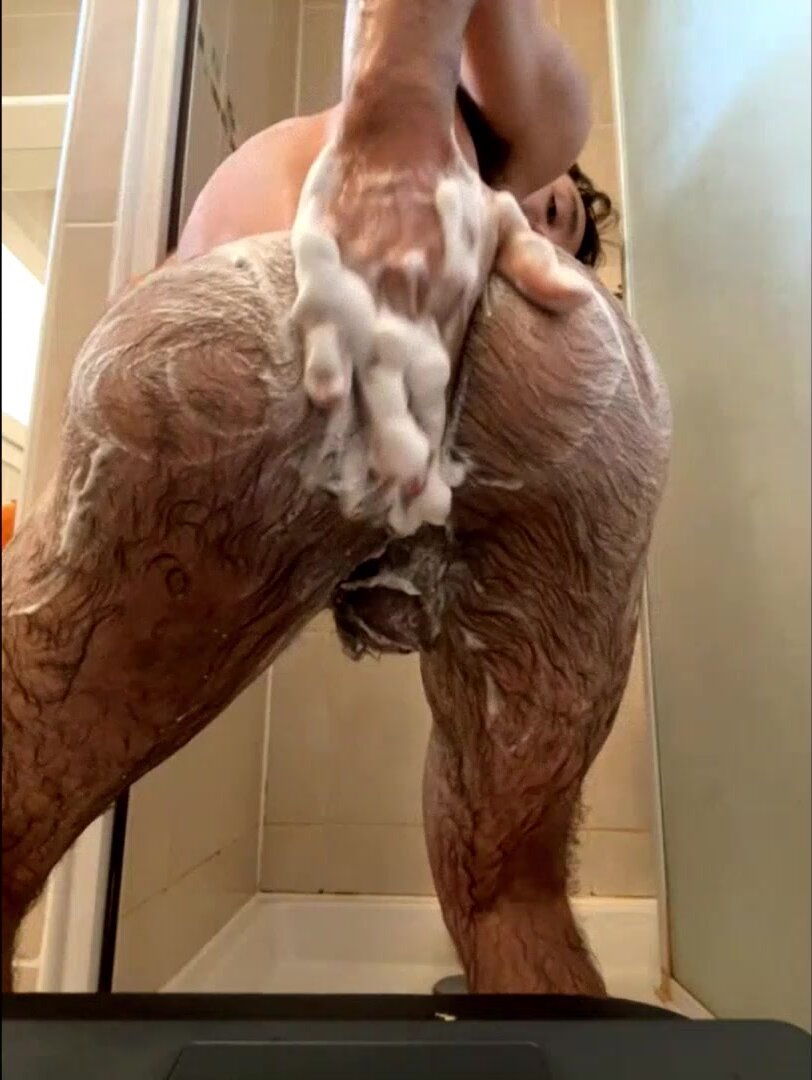 Beautiful young twink with hairy body in the shower