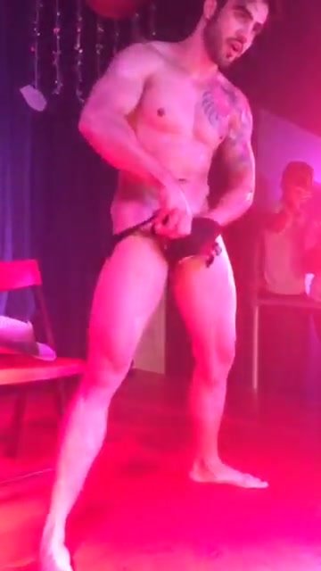 A hot teasing latino stripper
