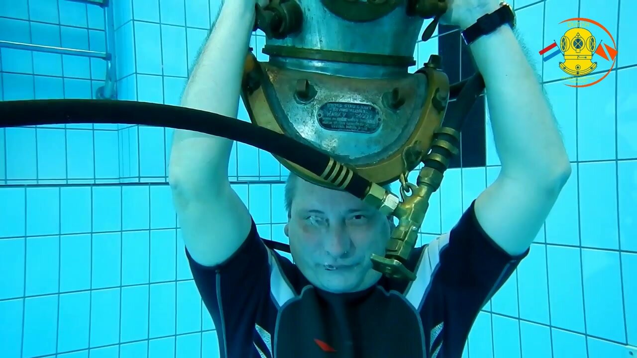 Dutch helmet diver going barefaced underwater - video 2