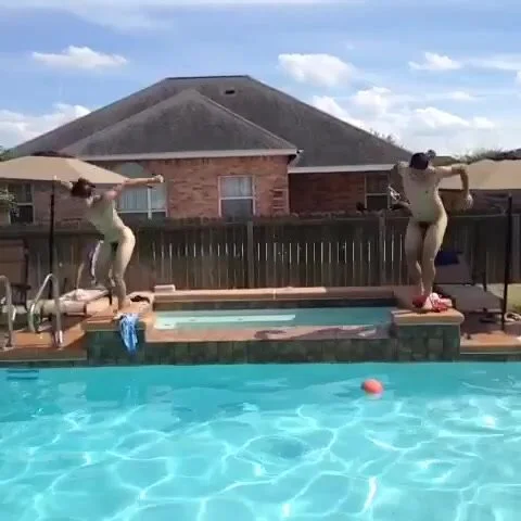 Double Naked Diving Into Pool