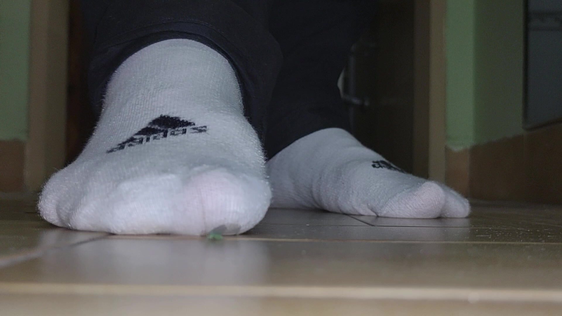 Socked feet Vs annoying bug