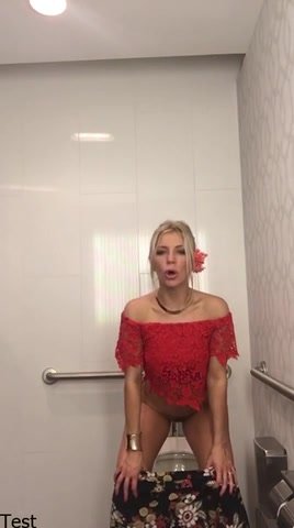Blonde Chick Pisses Over Toilet
