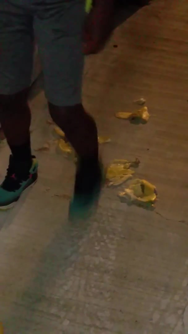 Teen Boy steps on bananas with his Jordans