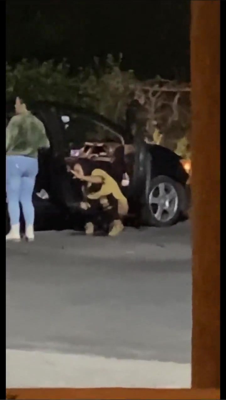 Girl caught pissing outside of car in parking lot