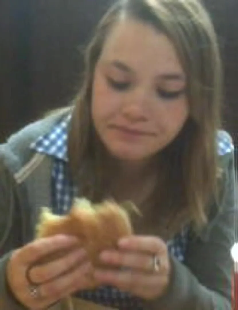 Sexy college girl eating a Big image