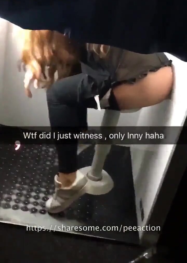 Cute naughty teen pissing in a photo booth