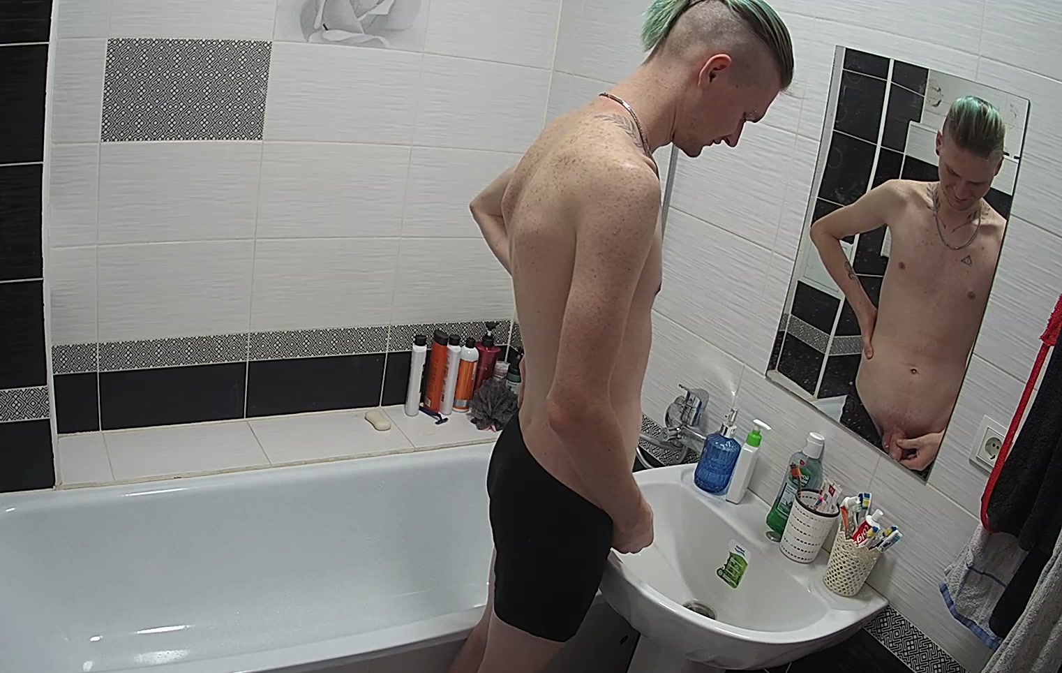 Guy pissing in the sink