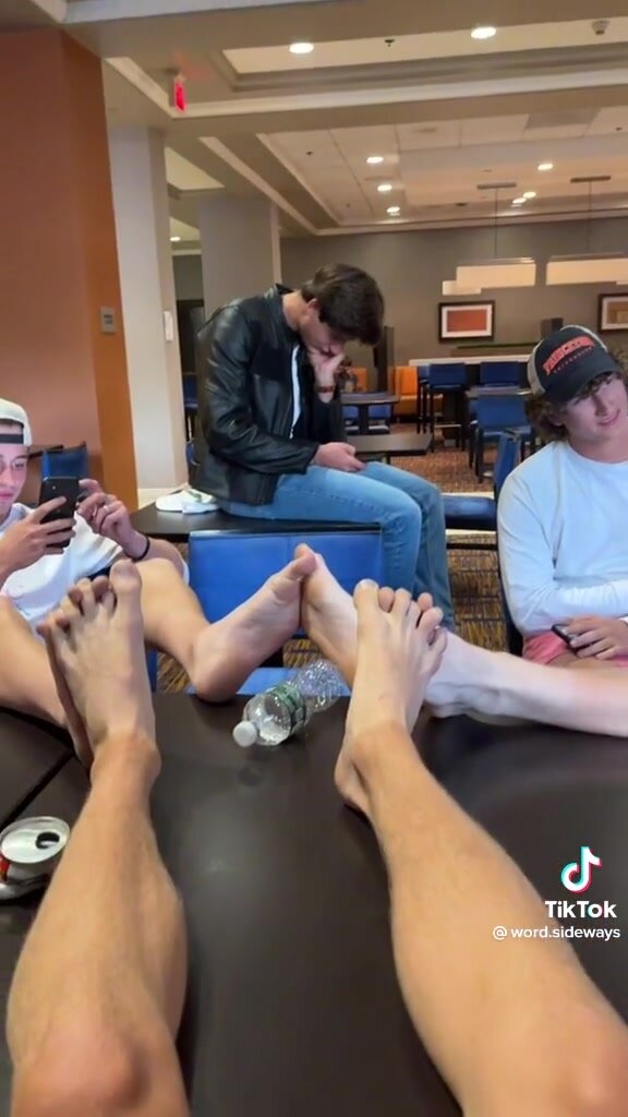 Group of teen boys showing their feet