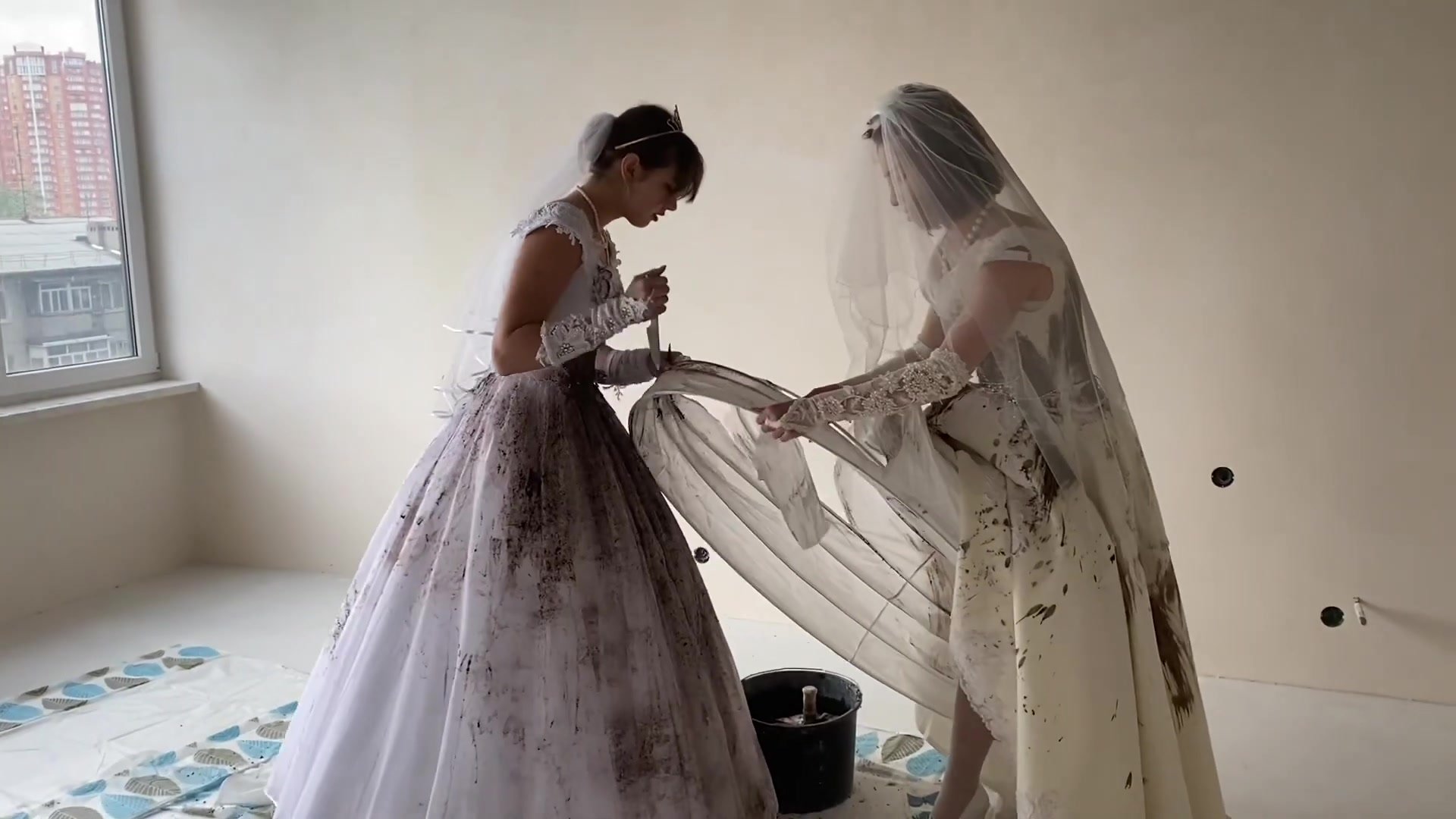 girls destroying their wedding dresses