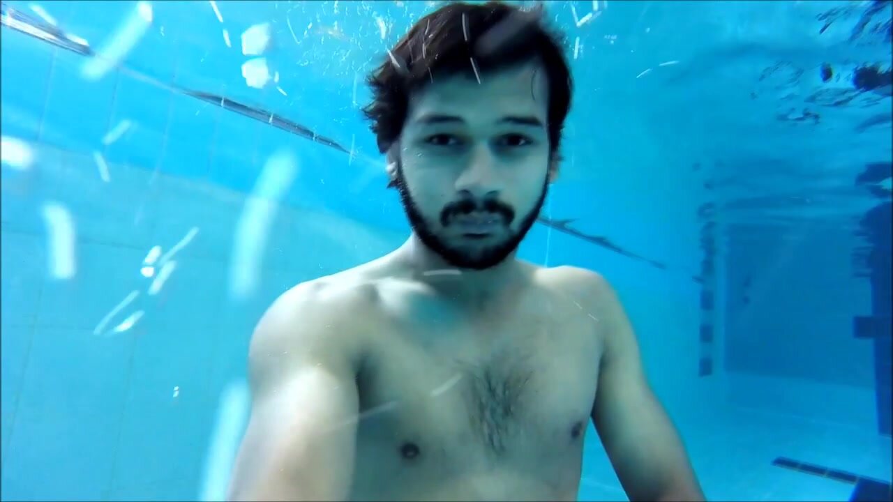 Underwater barefaced cutie in pool - video 3