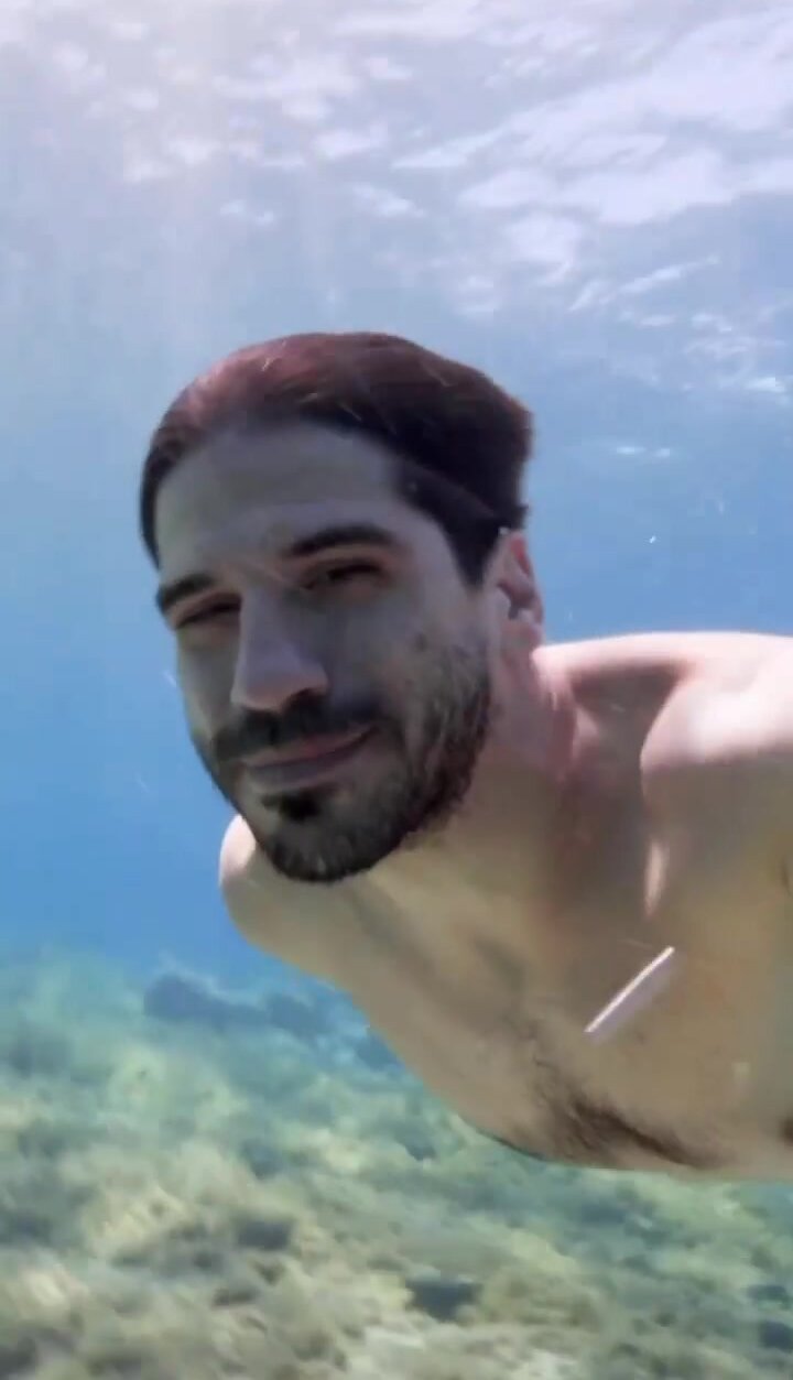 Underwater barefaced selfie in sea