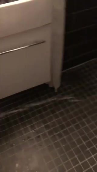 Girl pees outside toilet