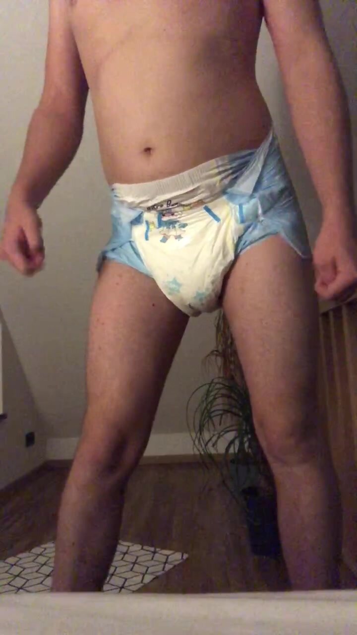 Little big baby boy floods his diaper