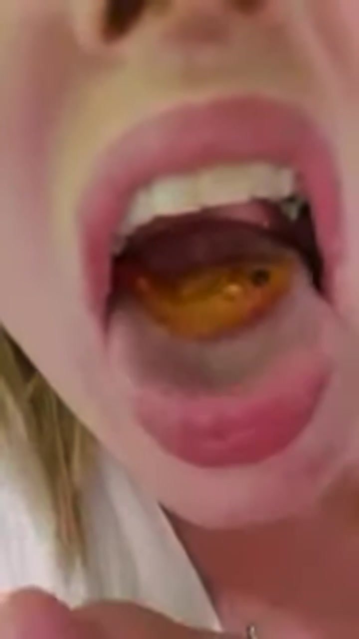 Girl Swallows Fish - video 2