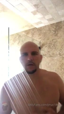 bald man jerks off in the shower